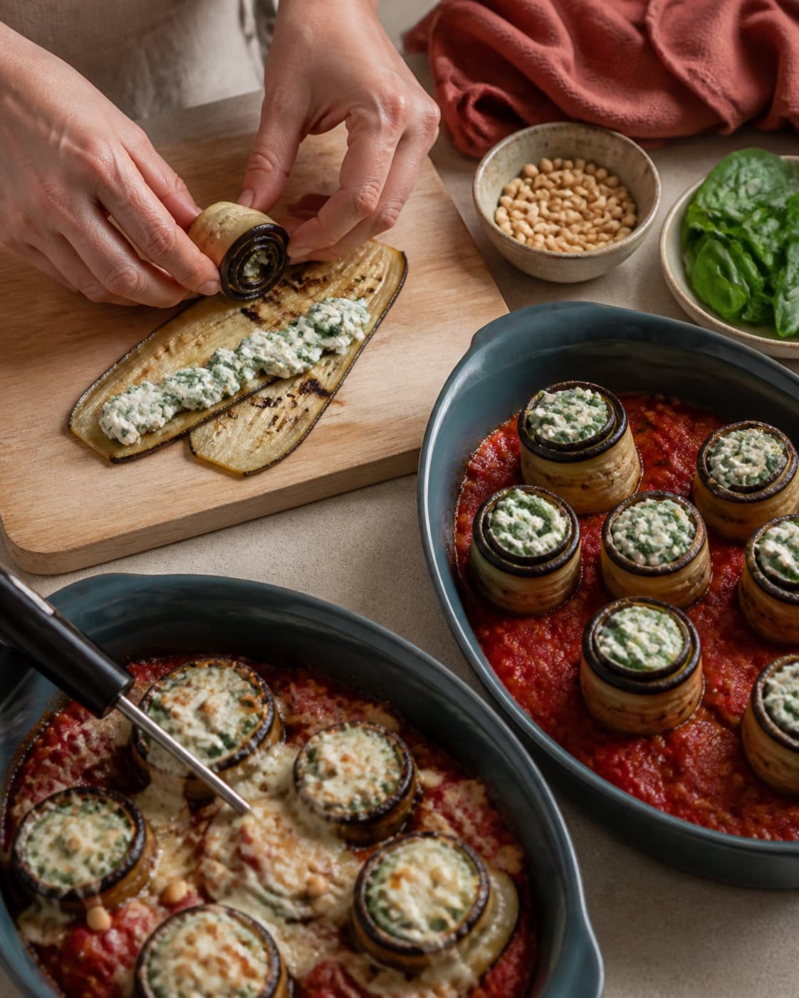 To overlappende auberginebånd med ricotta-spinatfyld rulles opret i sauce, mens en bagt roset måles i centrum