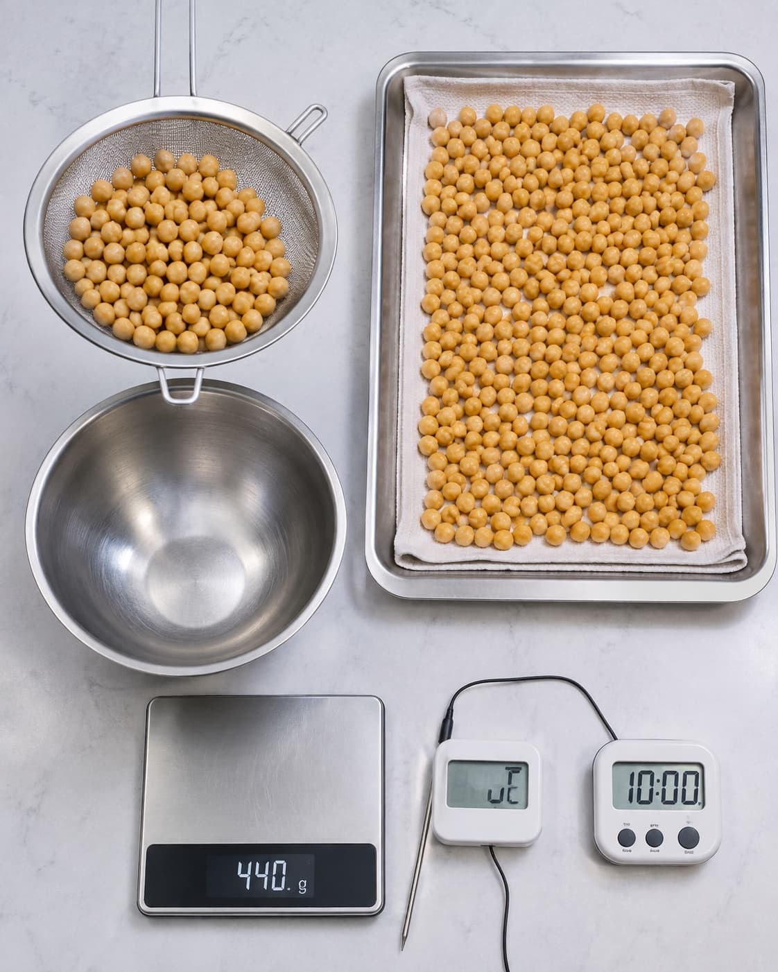 440 gram fuldt kogte kikærter skylles og tørres i ti minutter
